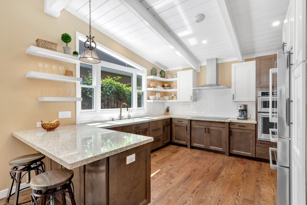 Kitchen addition with floating shelves and granite countertops by Heartwood Residential Design + Build