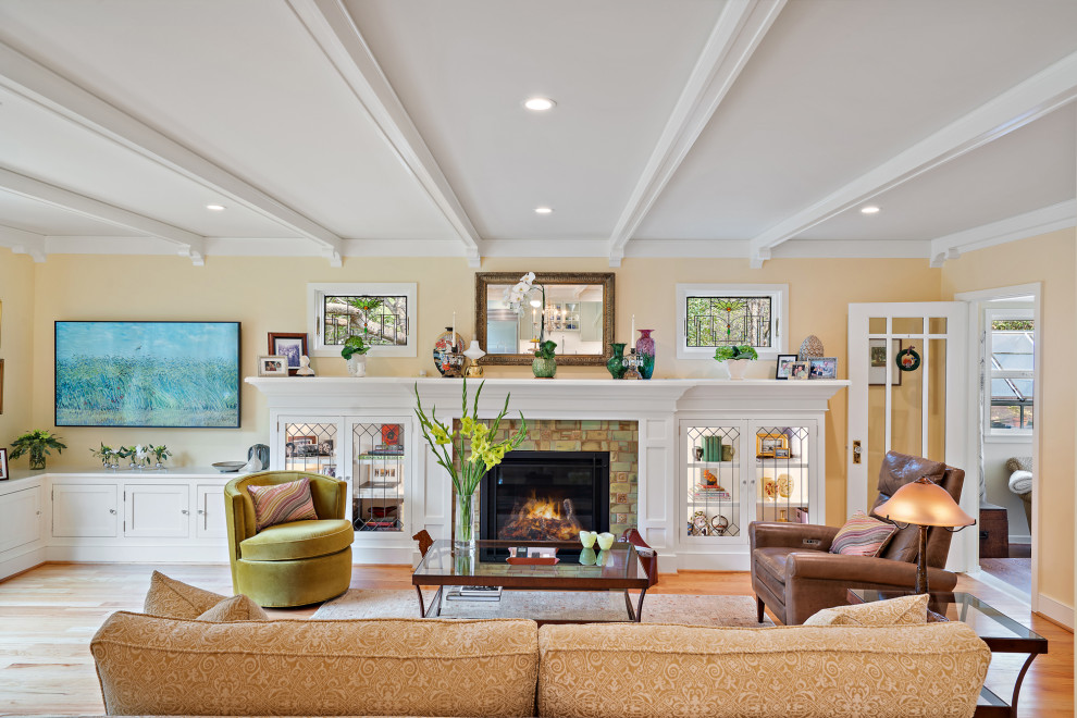 Remodeled Living Room with Fireplace and Sitting Area in Santa Clara County, CA by Heartwood Residential Design + Build